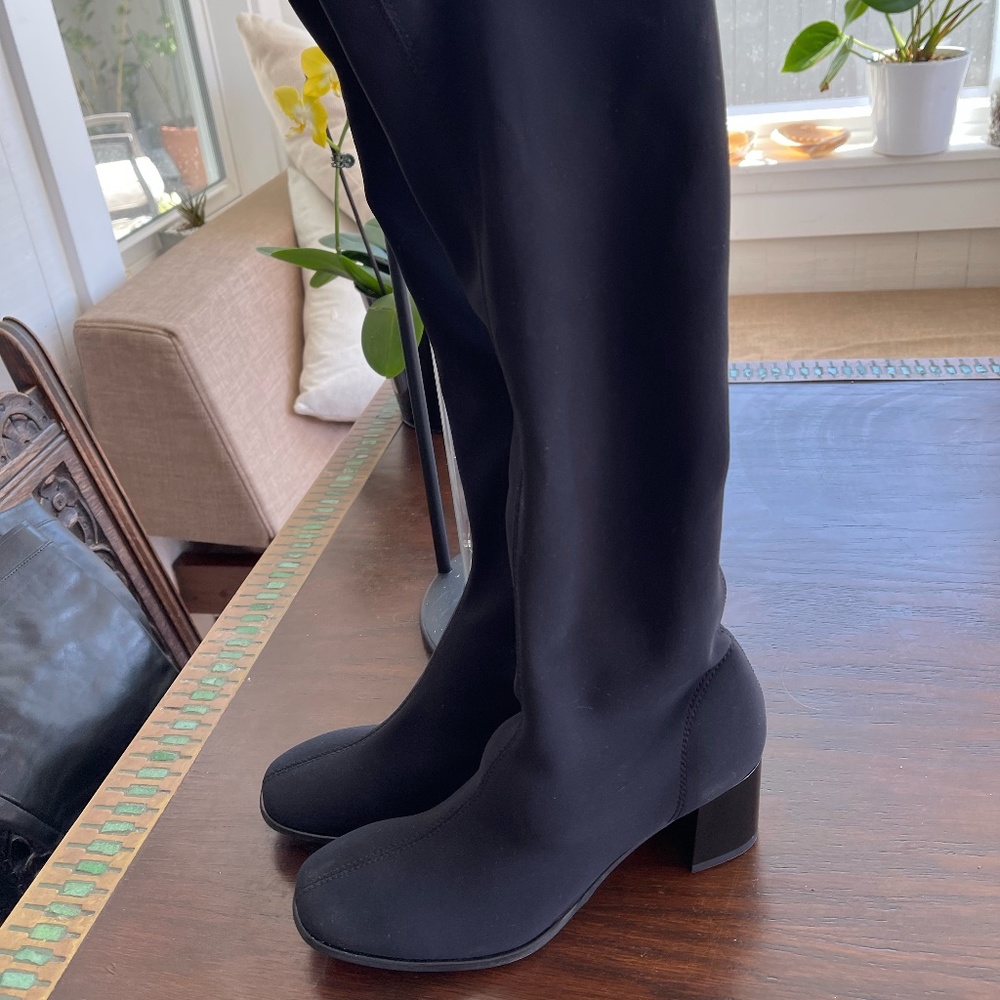 Black Onex tall boots with a block heel and rubber sole. Size 7